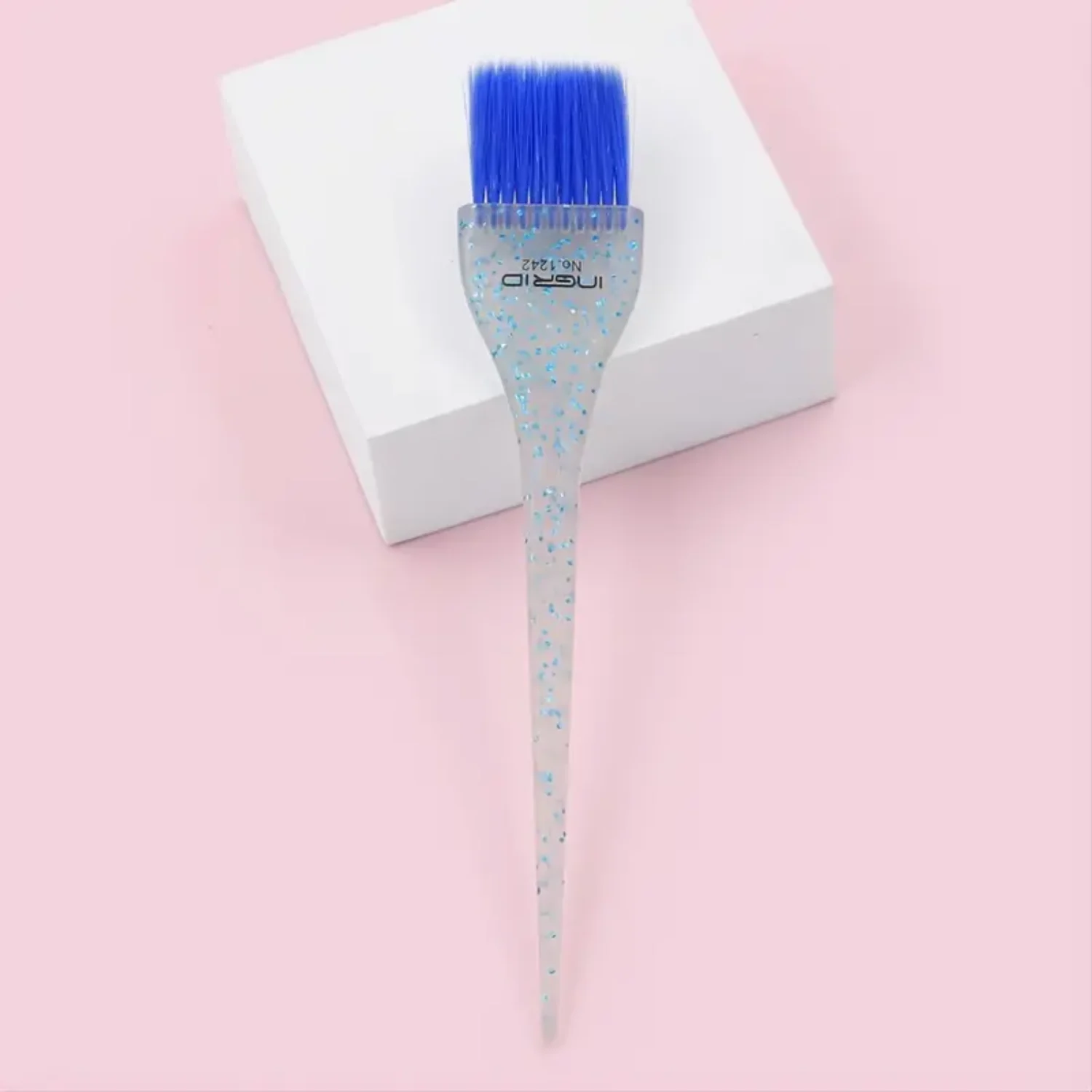 

Luxury Glitter Brush with Soft Feathered Bristles and Cosmic Multicolor Handle for Stunning Makeup Results