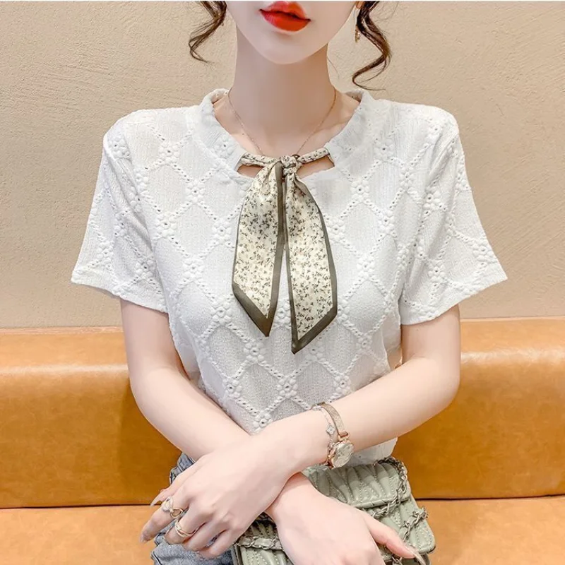 2023 Summer Fashion Korean Edition Round Neck Lace Up Reduced Age Lace Hollow Jacquard Short Sleeve Women\'s Solid Color Shirt