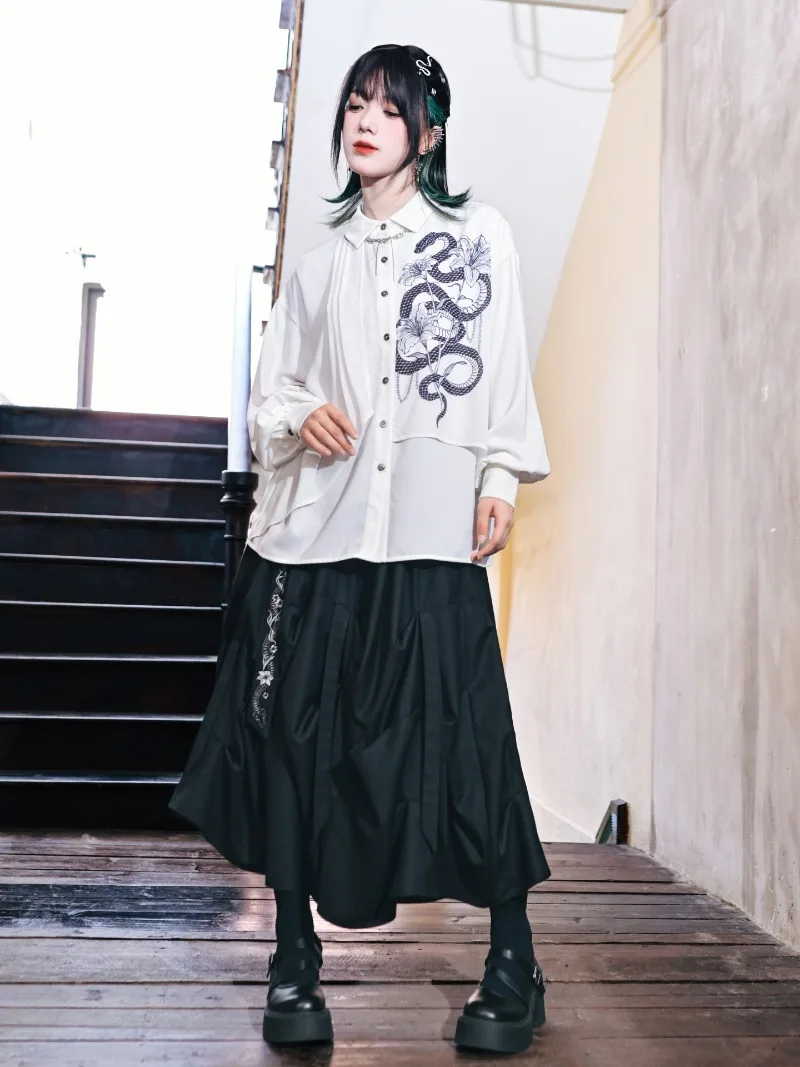 Design Sense – jupe mi-longue plissée irrégulière, amincissante, noire, décontractée, Cool, pour dames, nouveau Style chinois, jupes brodées, vêtements pour femmes