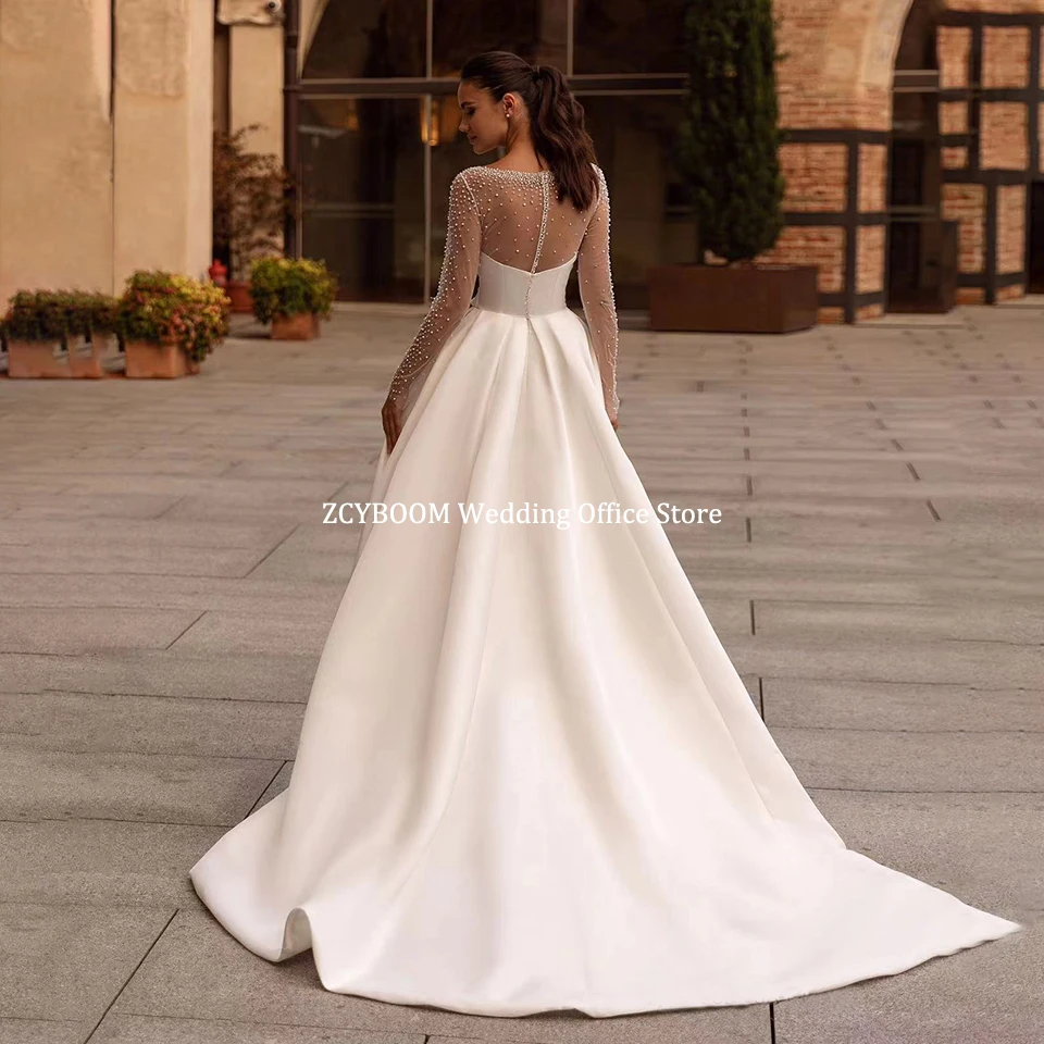 ประดับด้วยลูกปัดหรูหราแขนยาว A-Line ชุดแต่งงาน 2025 เซ็กซี่สูงด้านข้าง Scoop คอภาพลวงตากลับชุดเจ้าสาว ...