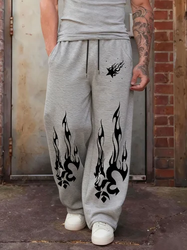 Imagen 2 del producto Joggers negros de pierna ancha para hombre, pantalones de calle dinámicos con estampado de llama blanca y estrellas de alto contraste, pantalones de chándal de Hip Hop de gran tamaño, tendencias