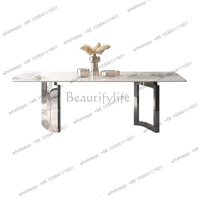 

Italian light luxury minimalist rock slab dining table creative stainless steel rectangular dining table