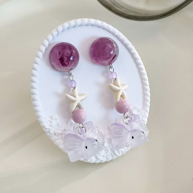 

Cute Small Fish Earring Creative Resin Fish Pendant Purple Earrings Unique Ocean Series Design Resin Goldfish Earrings Wholesale