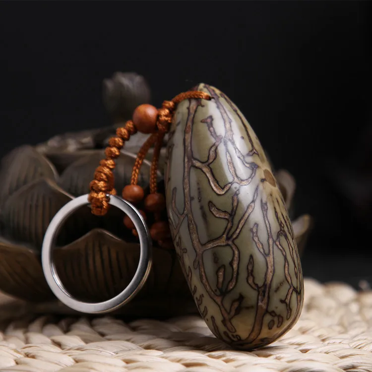 

Natural Argus Bodhi keychain pendant 7-9 cm Bodhi seed car keychain Bodhi fruit hand play piece