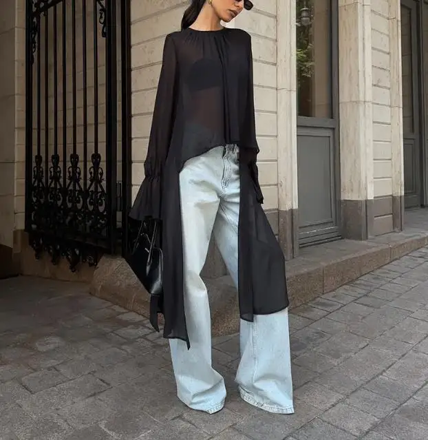 Camicia filata vento e neve, rete nera da donna irregolare, design di nicchia, girocollo, maniche a foglia di loto, top a maniche lunghe