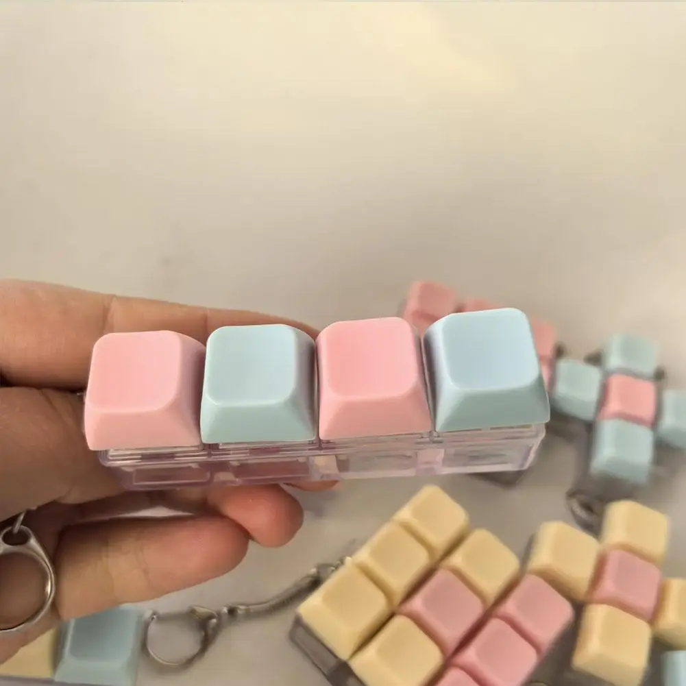 ของเล่นคีย์บอร์ด 9 ปุ่มทดสอบกดสวิตช์พวงกุญแจบีบอัดจี้สีอ่อนแบบพกพาอุปกรณ์เสริมคีย์บอร์ดบีบอัด
