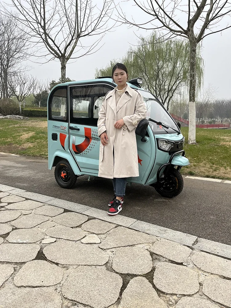 enclosed electric tricycle with shed for home transportation of children, small delivery battery, three cars can be licensed