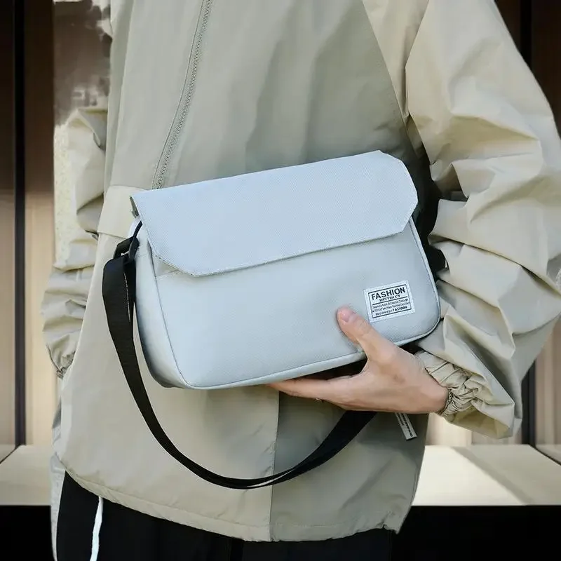Moda de rua masculina Oxford bolsa de ombro sólida crossbody casual satchels 2025