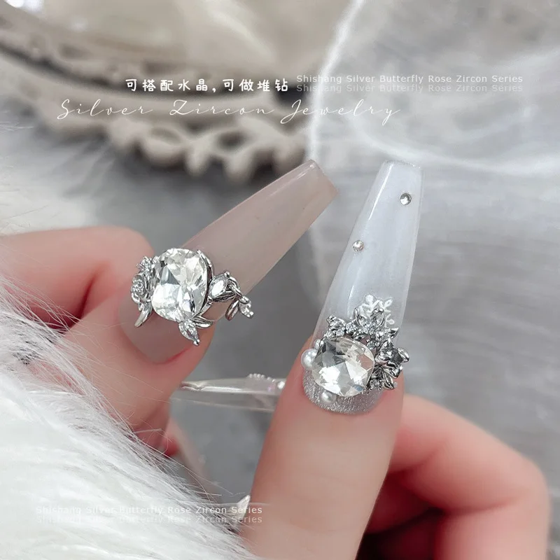 5PCS Nail Art Zircon Bowtie รูป 3D Charms โลหะเงินหรูหรา Rose ผีเสื้อโลหะอัญมณีสําหรับตกแต่งเล็บ