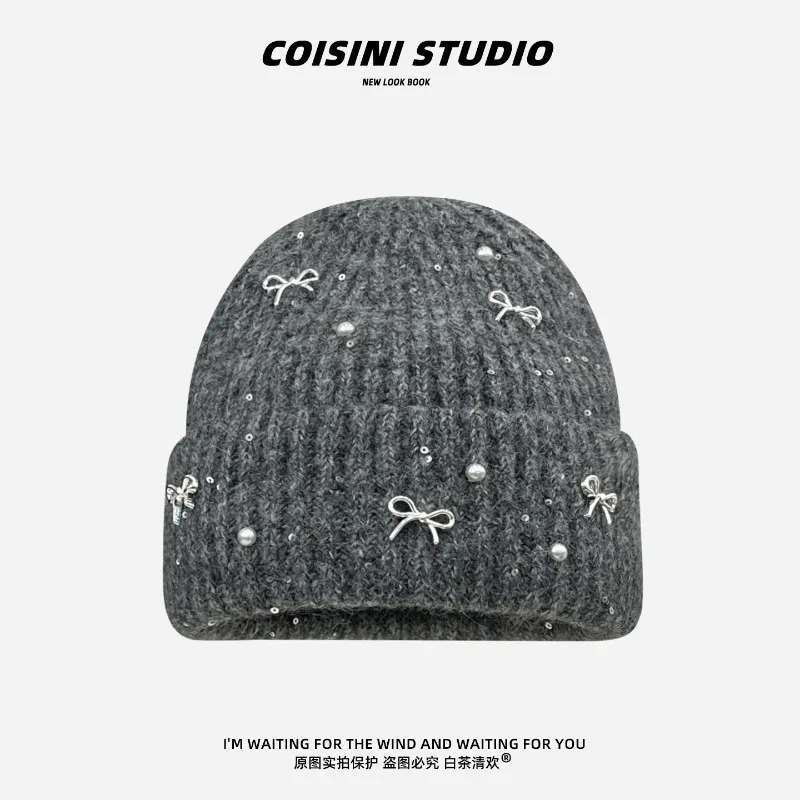 Koreanische Schleifenkappe mit Perlen für Damen, Herbst und Winter, einfache, warme, große Ohrenschutz-Strickmütze. – Detail 1