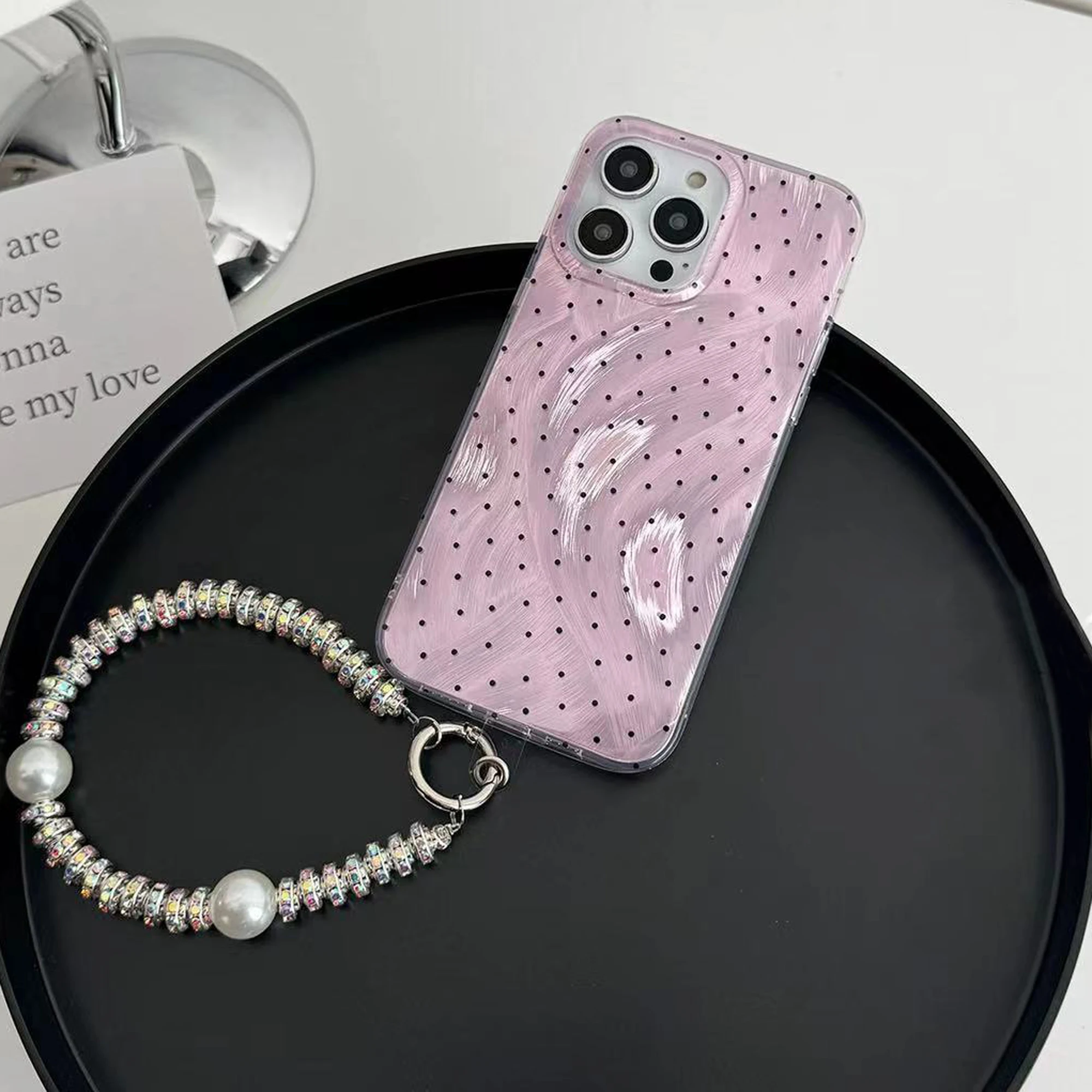 The new colorful polka-dot phone case with chain is suitable for iPhone 15 14 13 12 11 all-inclusive shock-proof girl phone case