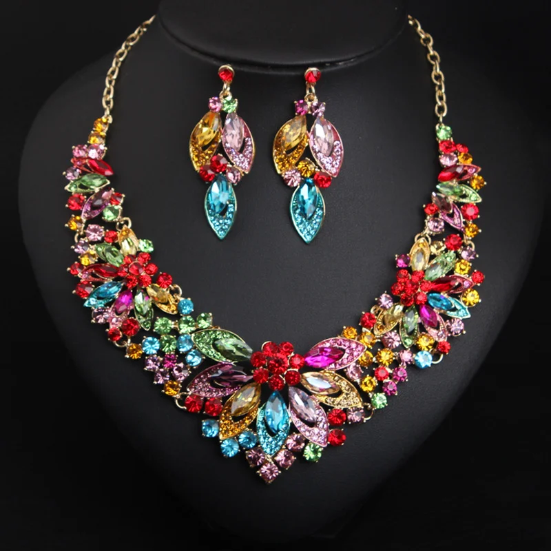 

Alloy necklace and earrings set with crystal gemstones. High-quality waterproof jewelry