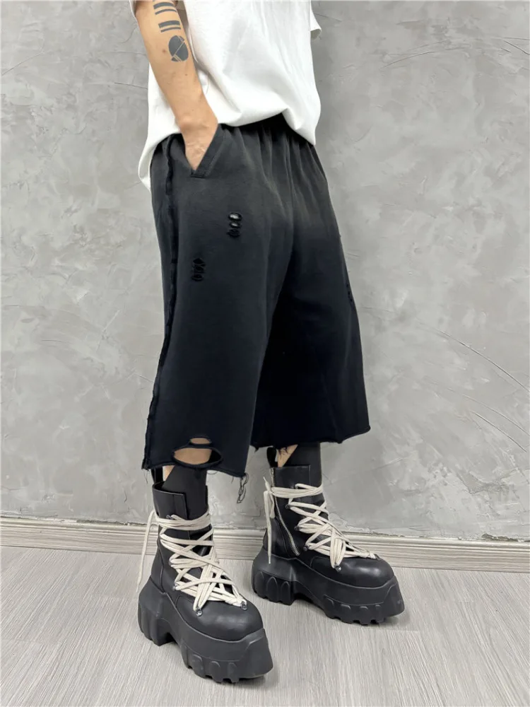 Zware donkere retro gewassen gradiënt gescheurde vrije tijd middenbroek mode trendy losse cropped shorts heren