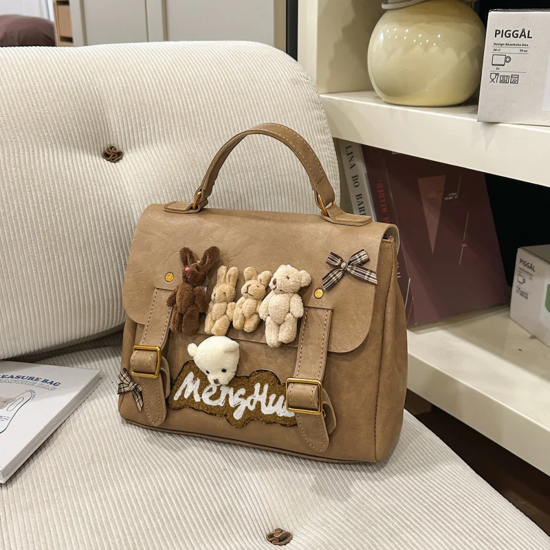 American-style niche cute plush toy backpack for women2025New College-Style Handbag and Crossbody Bag, Multifunctional Backpack