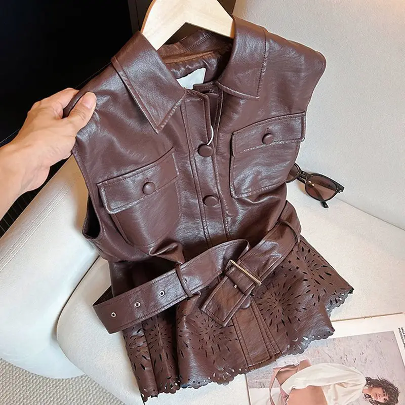 

Retro lapel belt leather jacket women's 2026 new cool sa wind hollow pattern hem sleeveless stacked vest