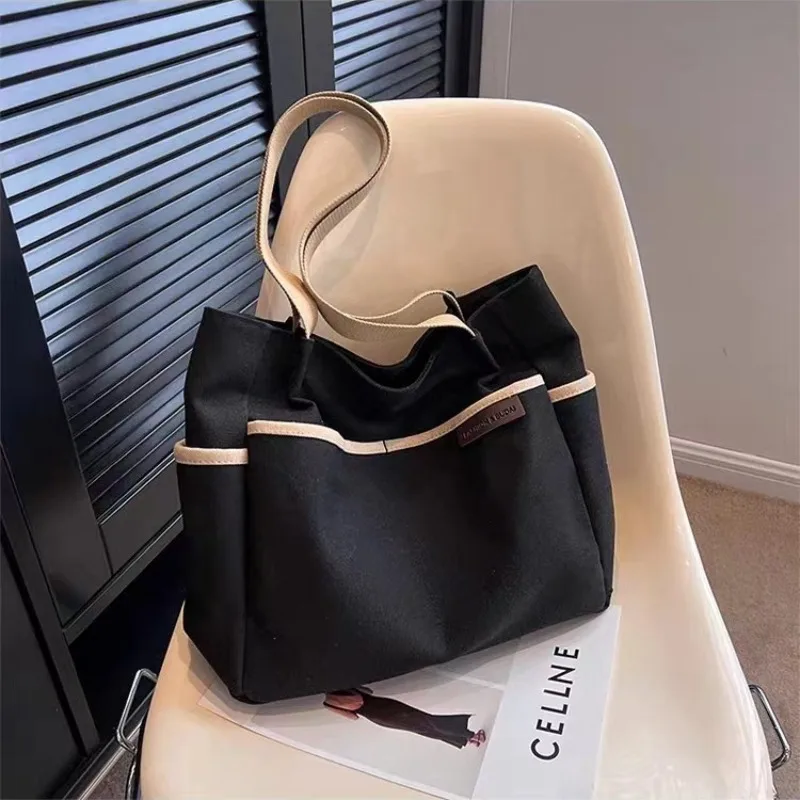 

Korean Version Simple Canvas Handbag, Large Capacity College Style Versatile Shoulder Bags, Suitable for Commuting To School
