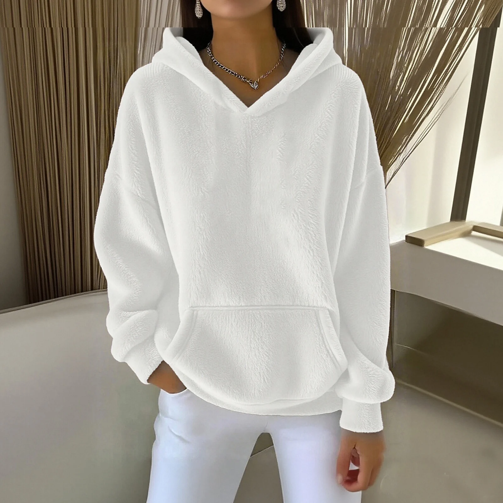 女性のファッションカジュアルルーズポケットぬいぐるみスウェットシャツ女性服冬服女性