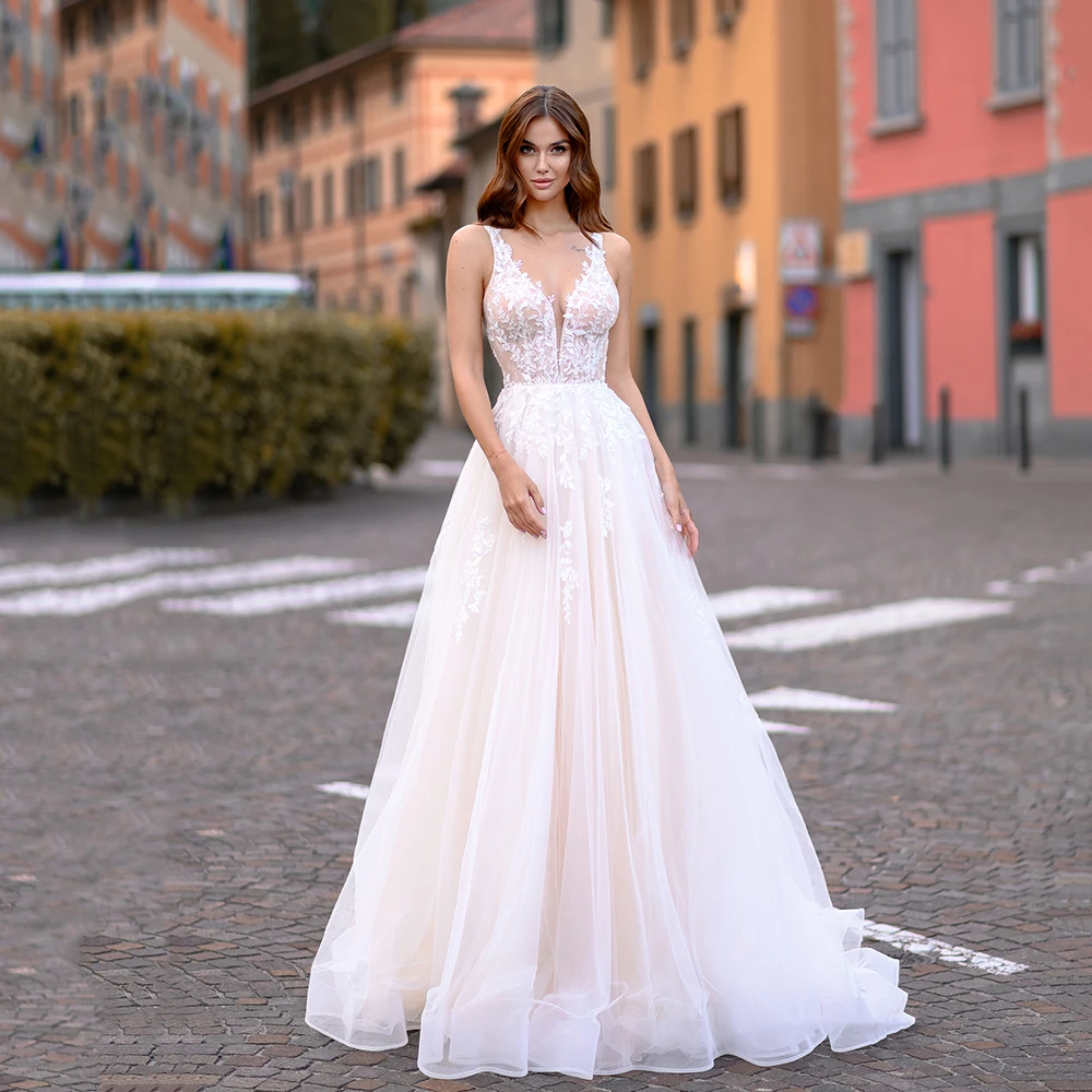 

2025 Luxury A-Line Wedding Dresses V Neck Illusion Sleeveless Tulle Lace Appliques Boho Sexy Backless Bridal Dresses Customized