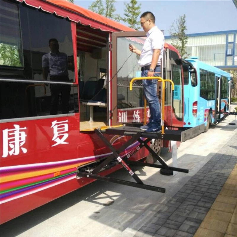 Hydraulic wheelchair lift platform for bus minibuses and installed in bus luggage