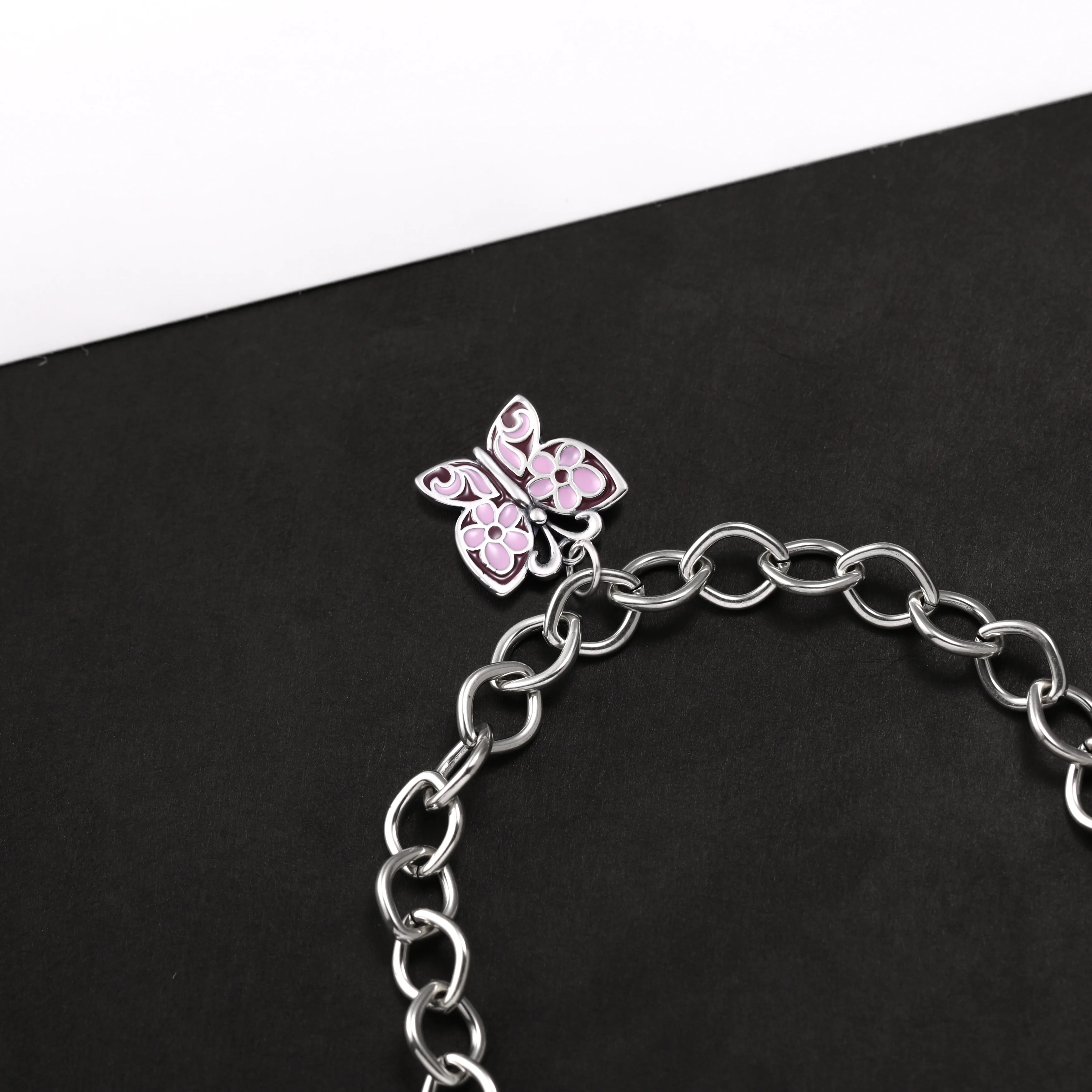 

Genuine 925 sterling silver Forged Link Charm Bracelet paired with a Pink enamel butterfly pendant