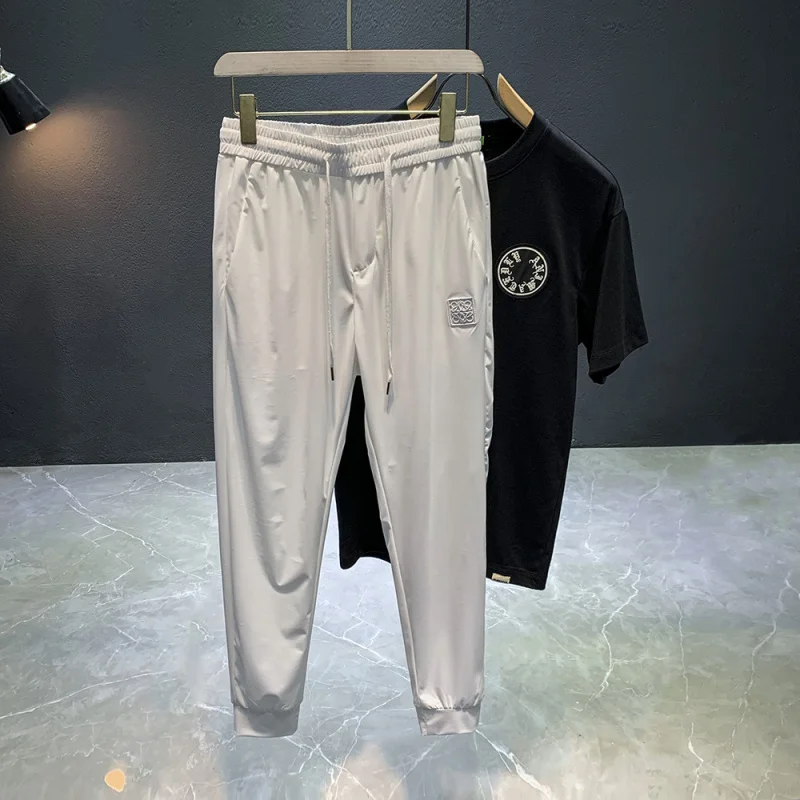 Light luxury ice silk pants for men's summer new fashion trend brand high-end embroidery sports quick drying casual pants