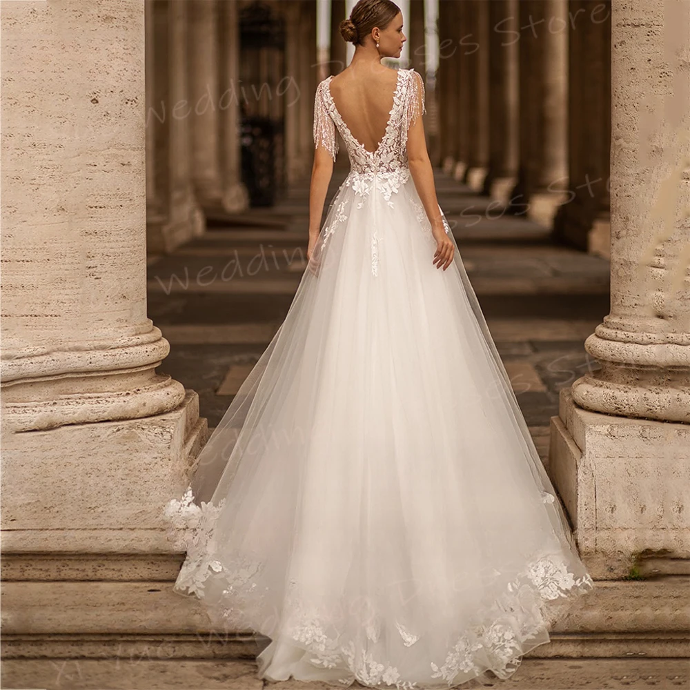 Sexy alla moda con scollo A V una linea abiti da sposa da donna eleganti Appliques abiti da sposa in pizzo senza maniche Backless Vestido De Noivas