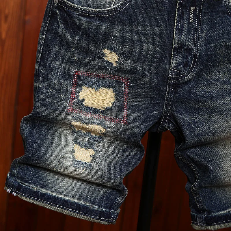 High end ripped patch denim shorts for men in the summer of 2025, scraped and fashionable trend, classic retro pants