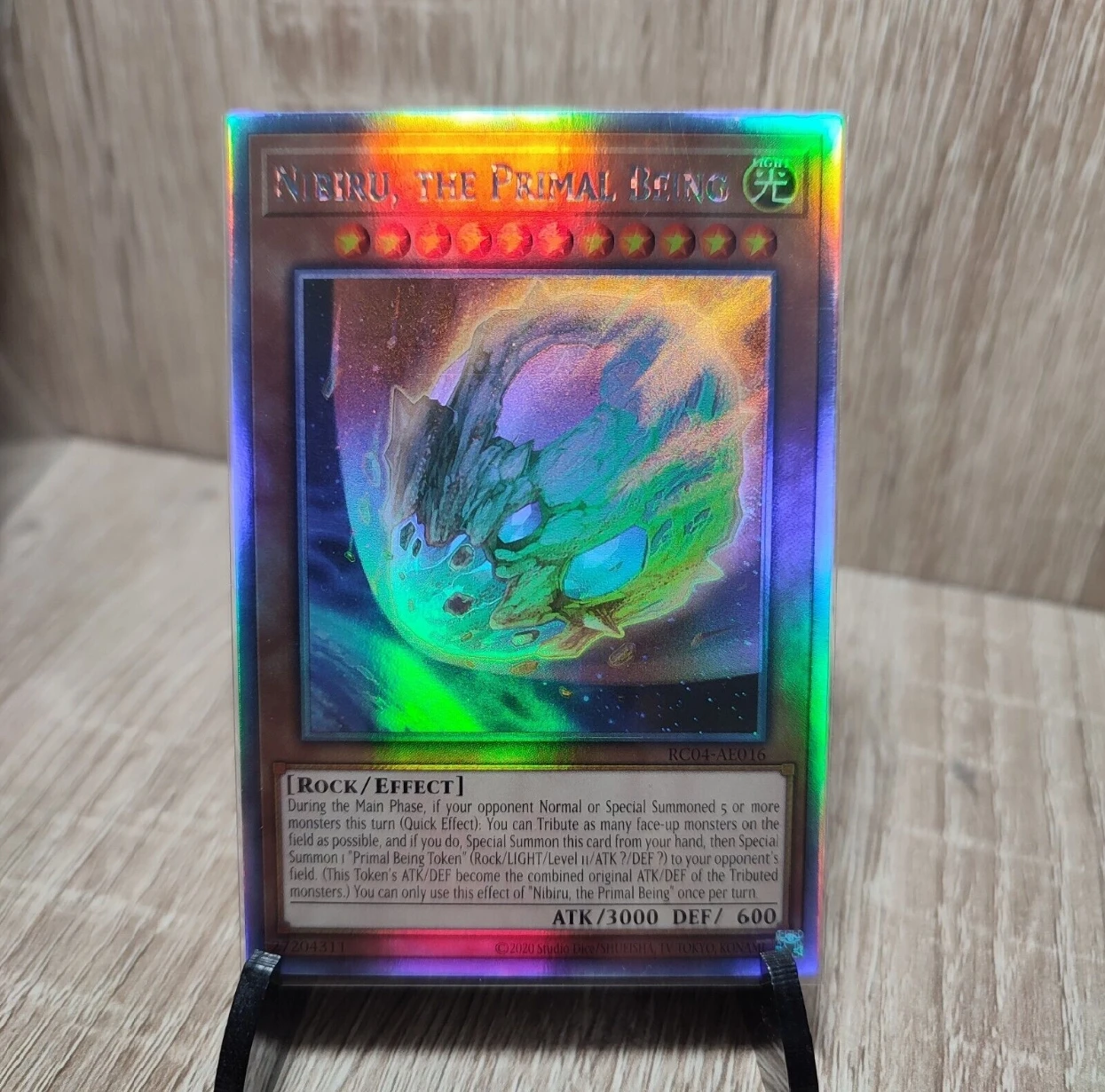 

Yugioh KONAMI Duel Monsters RC04-AE016 Nibiru, the Primal Being Ghost Rare Holographic Asian English Collection Mint Card