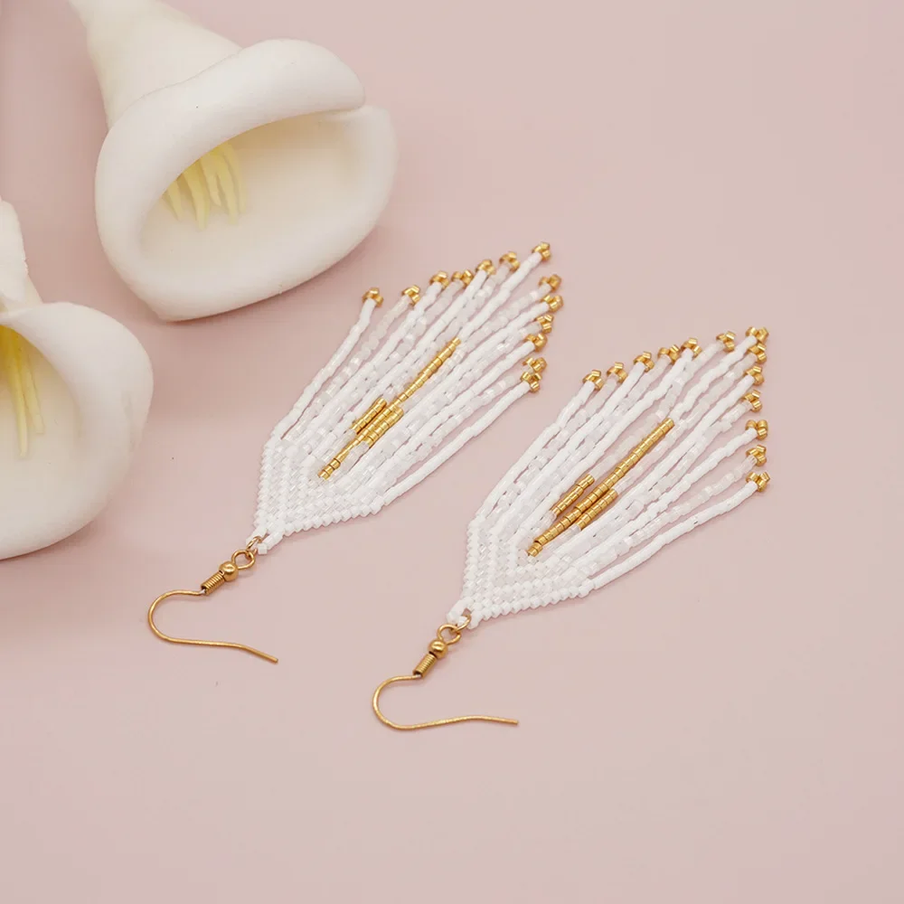 Rice bead earrings Tassel Originality Hand knitting Bohemia White Fashion Alloy Simple Beaded earrings