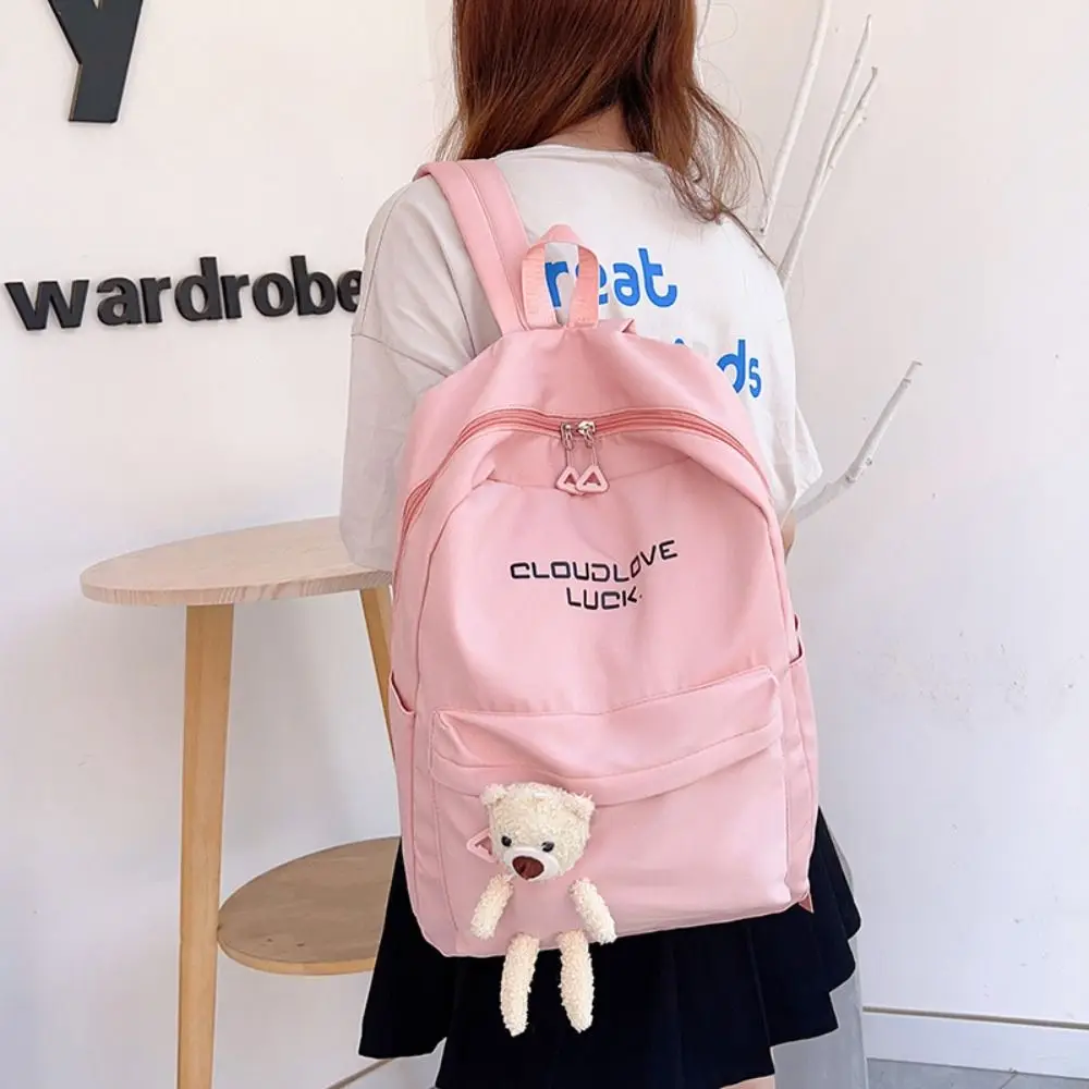 

New Large Capacity Student Schoolbag Solid Color Nylon Bags Niche Campus Backpack Aesthetic Schoolbag with Doll Simple Backpack