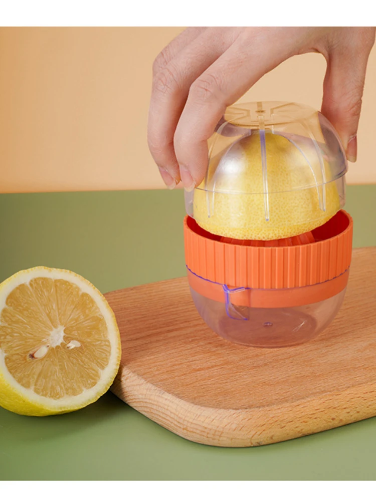 手動ジューサー,オレンジの絞り器,レモン用の回転式蓋付き