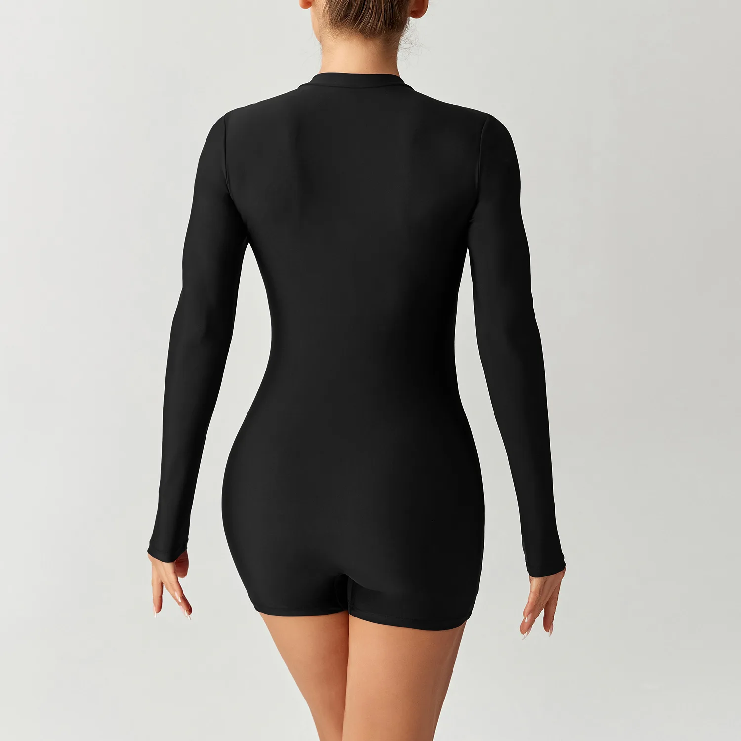 Traje de baño elegante de una pieza con protección solar para mujer, traje de baño de aguas termales y piscina, mameluco negro, pantalones cortos, ropa de playa