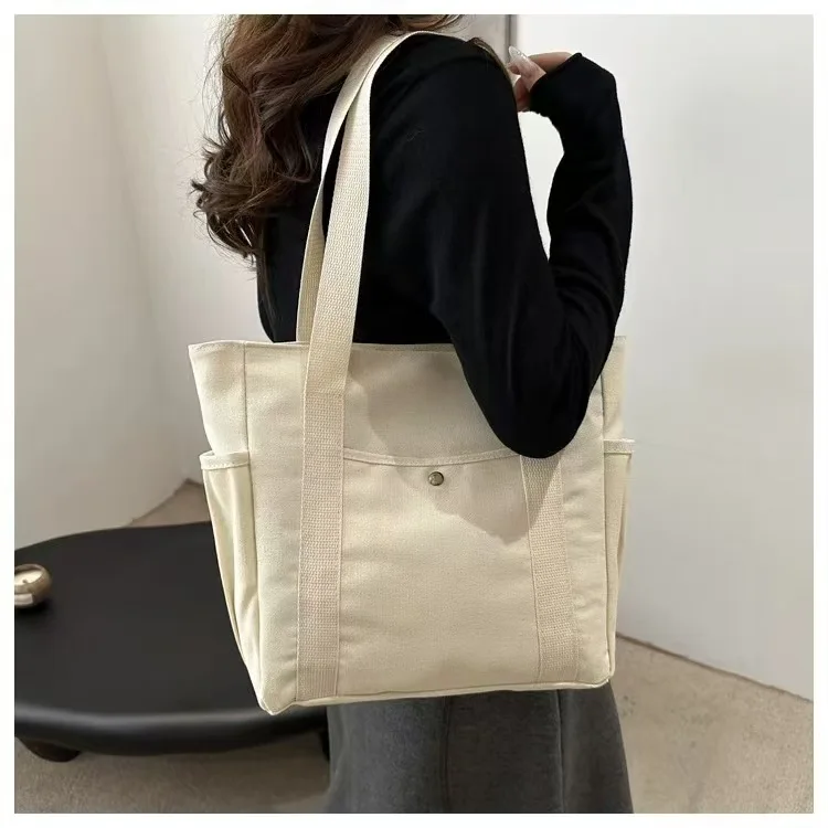 Große Canvas-Tragetasche für Arbeit und Ausgehen, Hochwertige Vielseitige Tasche für Pendler, Literarische und Künstlerische Studentenmode – Detail 6