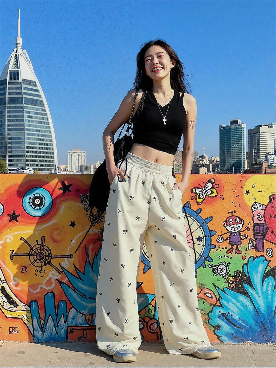 กางเกงขายาวทรงพาลาซโซผู้หญิงแบบผูกเชือก ทรงหลวม สไตล์ฤดูใบไม้ร่วง เอวสูง ทรงเข้ารูป ยืดหยุ่น เซ็กซี่ เหมาะสำหรับงานปาร์ตี้กลางคืน สีดำเงา