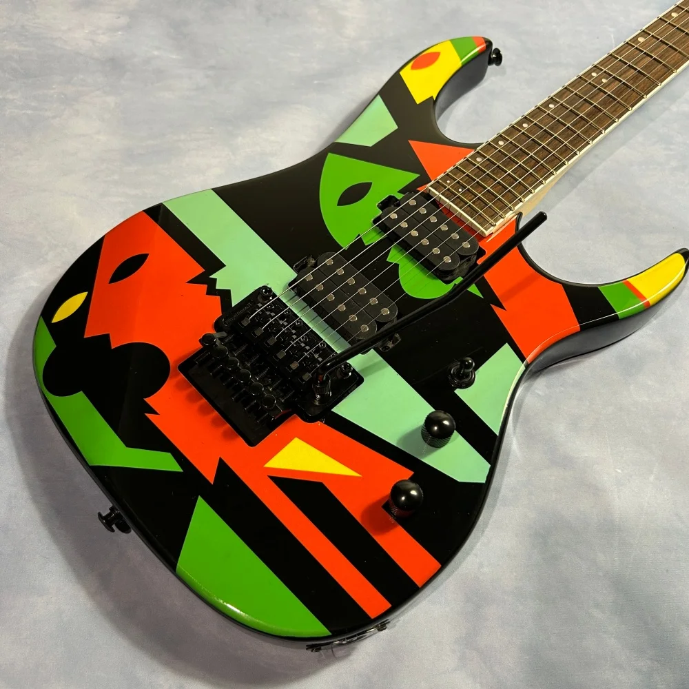Electric guitar; water transfer decal; double tremolo