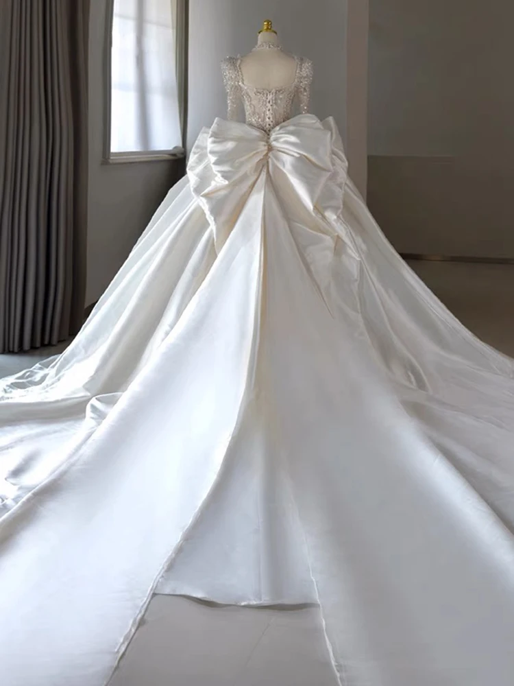Hochzeitskleid aus Seidensatin Dr. Long Sve Princ Sle Brautkleid Koreanisches Sle mit Perlen Mittlere Taille für den Innenbereich des Hotels