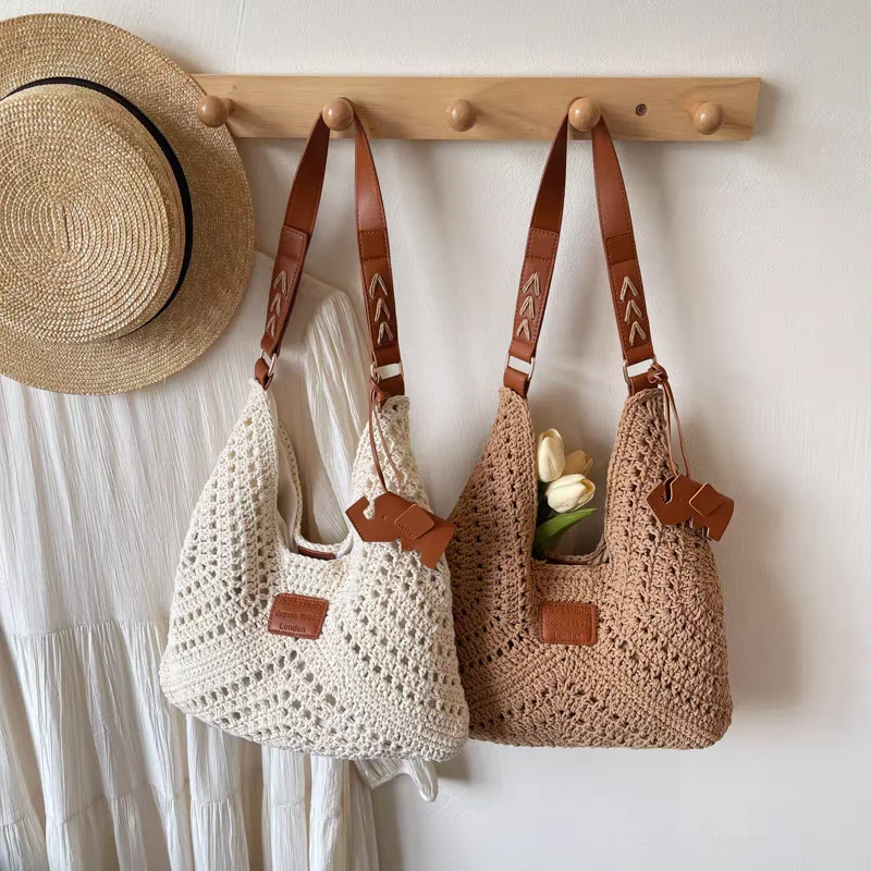 

Женская сумка 2025 года, новая модная полая сумка через плечо высокого уровня для пляжного отдыха, соломенная тканая сумка