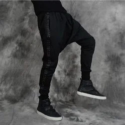 Men's Brand Stage Fashion Rock Fight Skin Rivets Big Crotch Pants Flying Squirrel Cross Low Crotch Pants Black Male Harem Pants