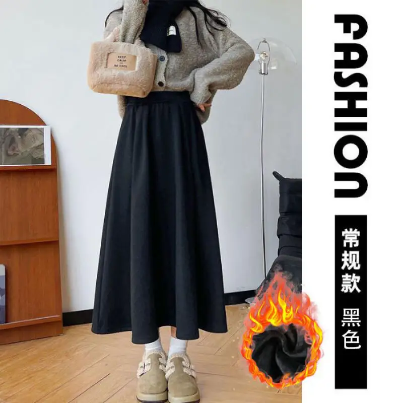 กระโปรงทรงเอไลน์สีข้าวเหนียวสีขาวข้าวโอ๊ต กระโปรงทรงเอไลน์ยาวปานกลางสำหรับผู้หญิง กระโปรงทรงเอไลน์ทรงร่ม สำหรับฤดูใบไม้ร่วงและฤดูหนาว กระโปรงลำลองเอวสูงสำหรับผู้หญิง สไตล์สบายๆ