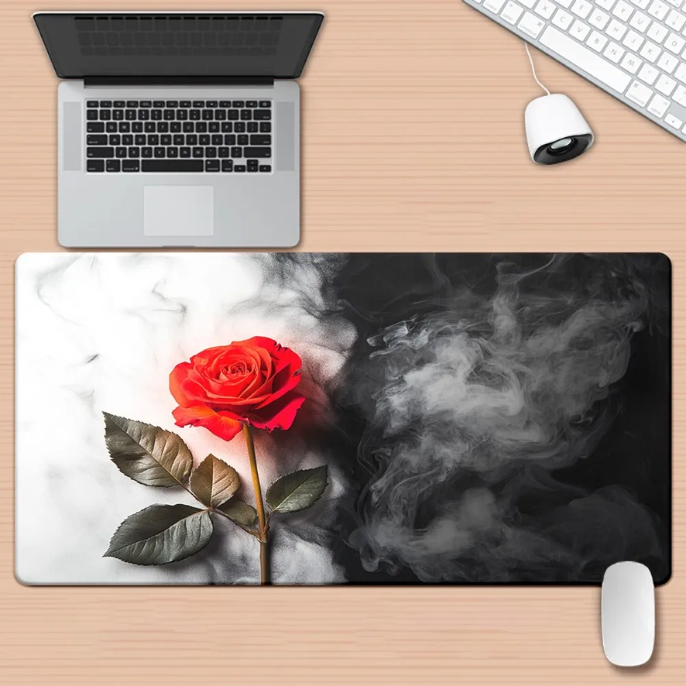 With red rose and smoke patterns, compatible with laptops, desktops, personal computers, and typing mats. Anti-slip mouse pad