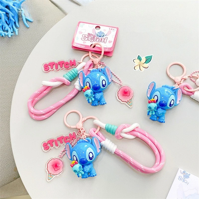 

The New Stitch Holding Doll Keychain Cute and Exquisite Mobile Phone Hanging Chain Hand Rope Doll Pendant Gift