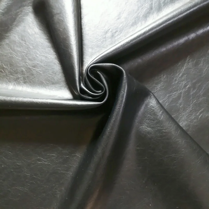 0.6mm Black PU Crackle Waxed Leather Fabric With Fabric Backing Soft Touch Material For Leather Jacket Skirt Making