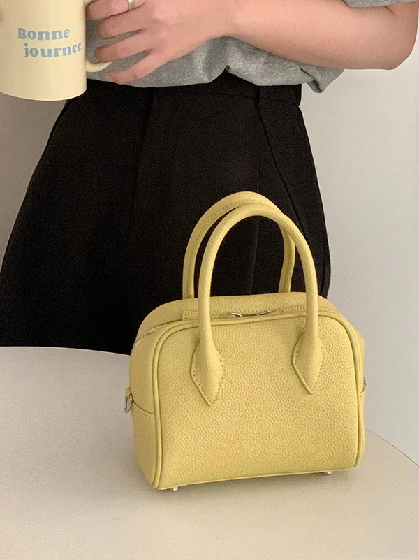 

Top Layer Cowhide Leather Faionable Bowling Bag Single oulder Crossbody Bag Handbag Casual Simple Sle Soft Handle