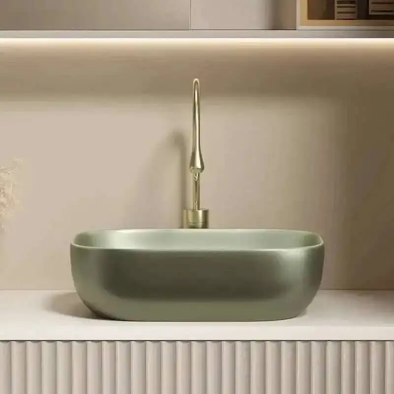 

Nordic Sinks for Ceramic Toilets Simple High-end Deep Above-the-counter Basin Luxury Oval Designer Bathroom Sink for Balcony
