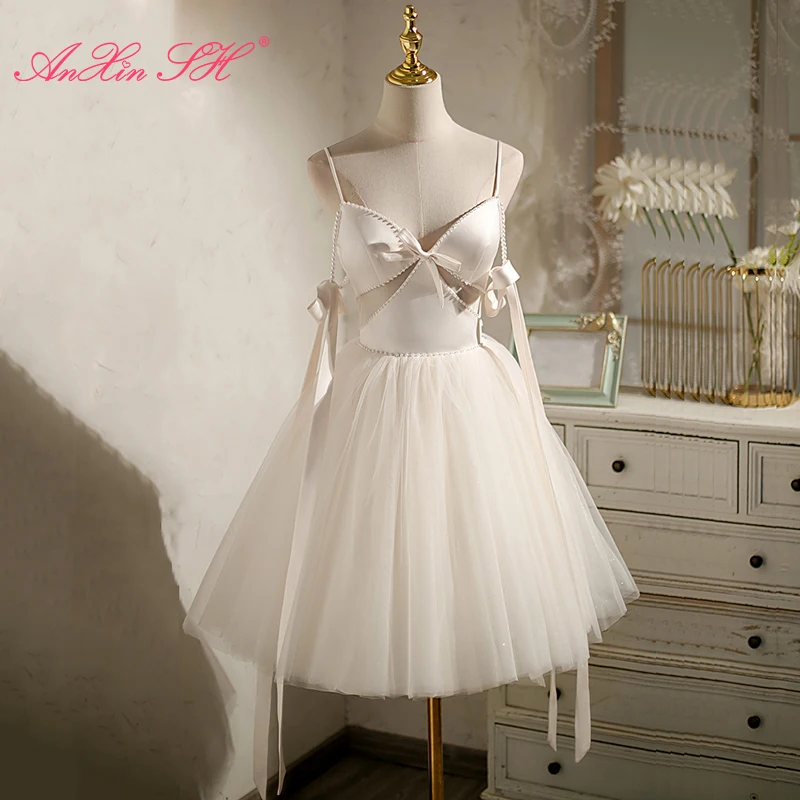 AnXin SH – robe de soirée courte en satin blanc, tenue de fête, bretelles spaghetti, perles, nœud de poire, petite robe blanche