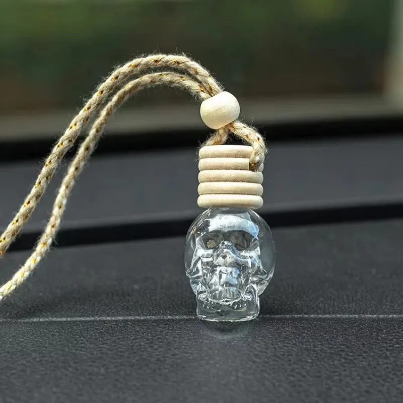 1PC Car Skull Perfume Bottle Aromatherapy Essential Oil  Hanging Auto Air Freshener Home Interior Decoration image 2