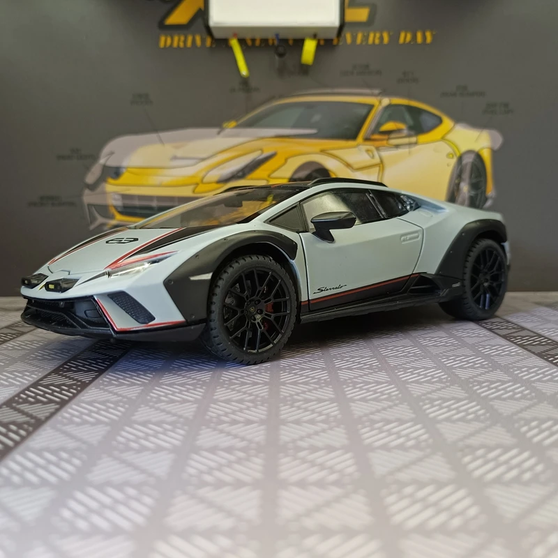 1:24 Lamborghini STO alloy car model ornament, shock absorption, steering, rebound, sound and light, supercar gift