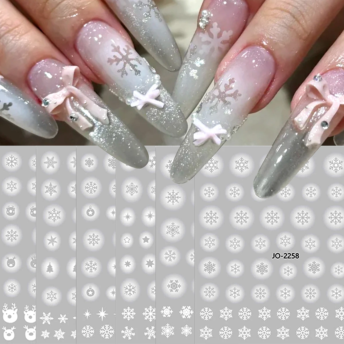 Cut-out snowflake nail art stickers featuring a variety of snowflake styles; suitable for DIY enthusiasts and nail designers.