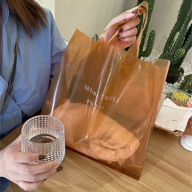 StoBag 50pcs Transparent Plastic Woman Shopping Shoulder Tote Bags Clothing Gift Packaging Big Portable Reusable Logo Wholesale