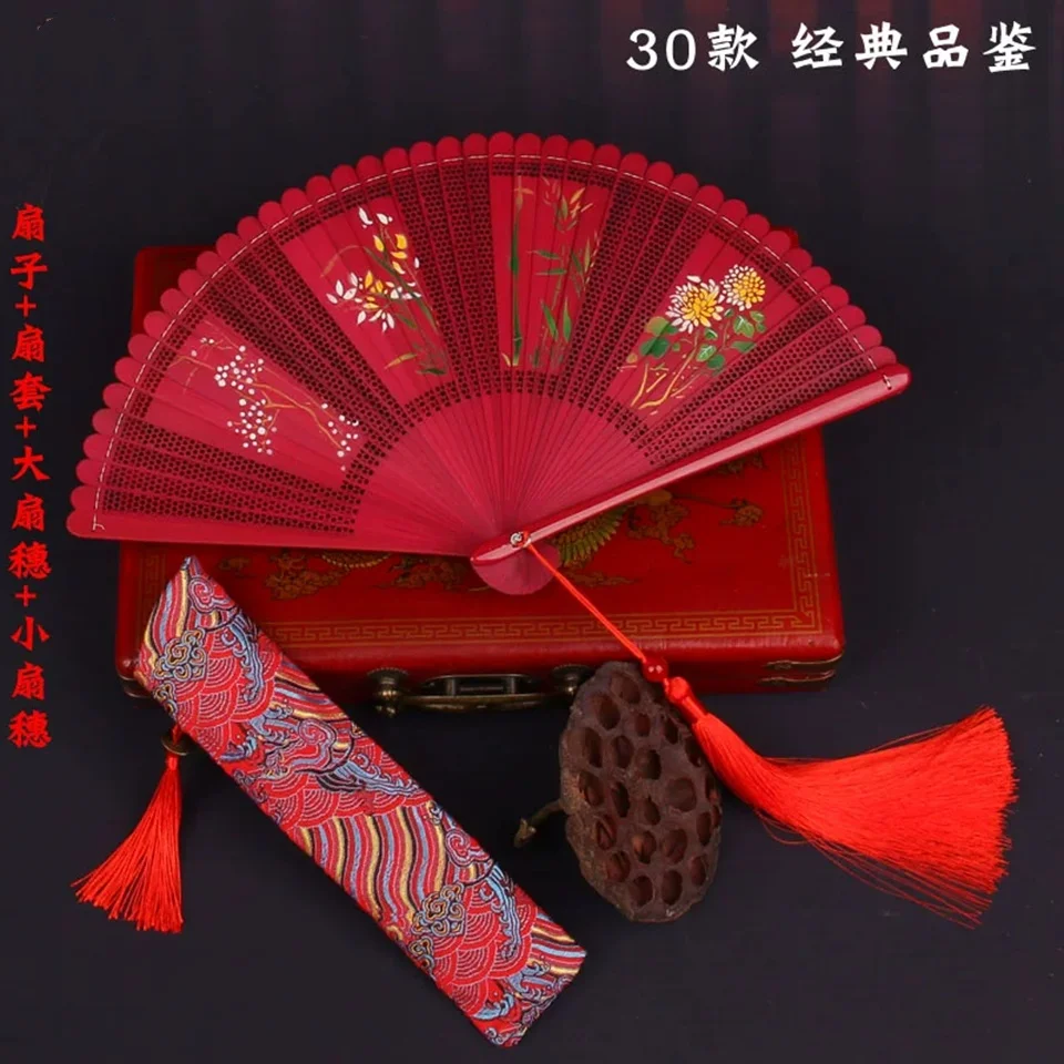 Small and portable bamboo fan with tassel folding, ancient Chinese style gift fan